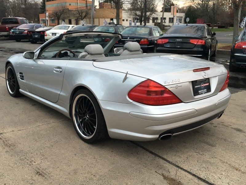 Illustration for article titled Why The Hell Would You Buy A Mazda Miata When This V12 Mercedes Is Way Cheaper?Â